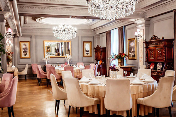classic luxury style restaurant with tables and chairs